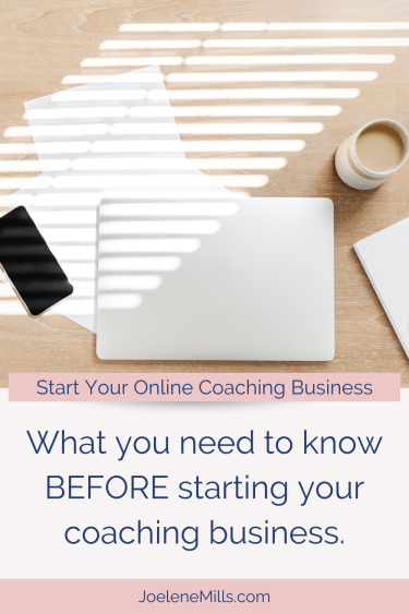 a laptop on a desk with coffee and a cell phone, with beautiful sun shining through the window onto thedesk