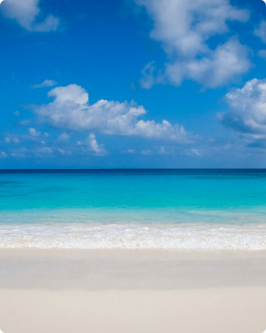 Calm beach and blue sky—symbolizing limitless potential, clarity, and aligned growth for introverted entrepreneurs in business.