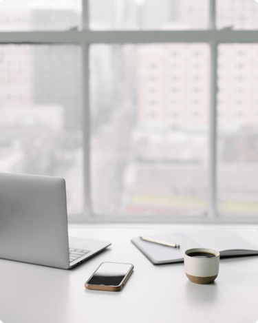 Tidy minimalist desk, introducing the  “Quiet Start Newsletter” 