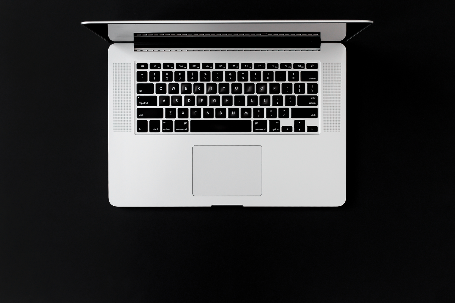 Laptop on black background for the article "7 Essential Steps for Introverts to Build a Successful Online Business"