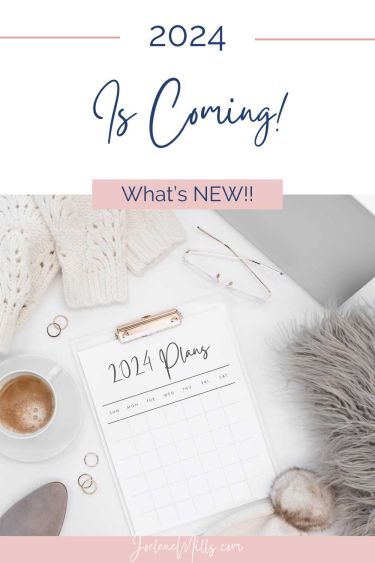 Calandar on woman's desk with the words what's new for 2024