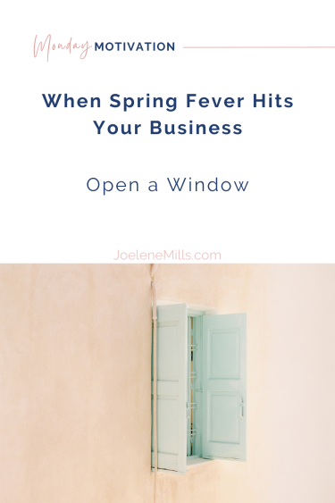 Soft pastel window opening on a sunny wall, symbolizing Spring Fever in Business and the fresh start introverted entrepreneurs need.