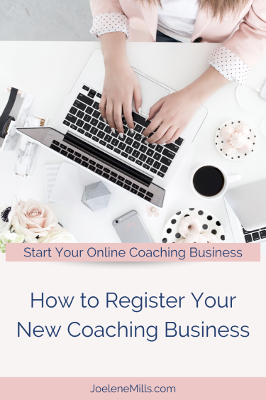 How to register your new coaching business written below an image of a woman in a pink blazer working on her laptop
