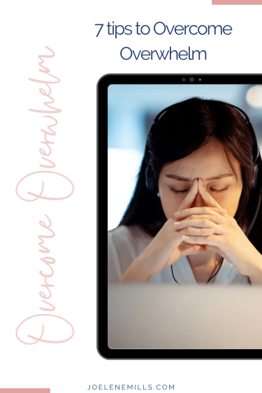 Woman sitting at her desk feeling overwhelmed and the words "7 tips to stop overwhelm"