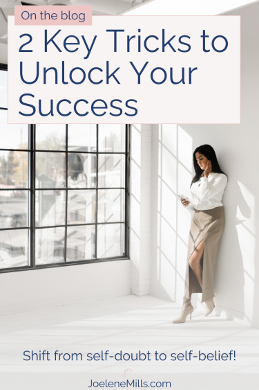 Business woman leaning on a wall beside large window with the words "2 key tricks to unlock your success"